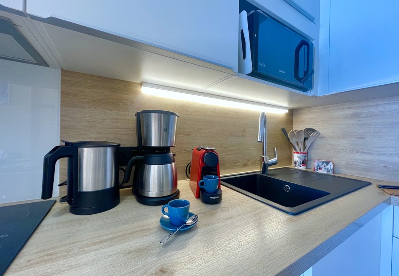 Apartamento en Les Menuires - (SO.414) T2 skis aux pieds  3 Vallées parking WIFI